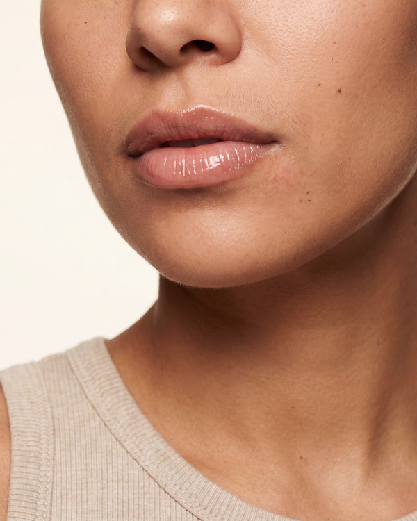 Soft, natural-looking lips with a glossy nude finish — Lip Filler new-client offer at HoneMD